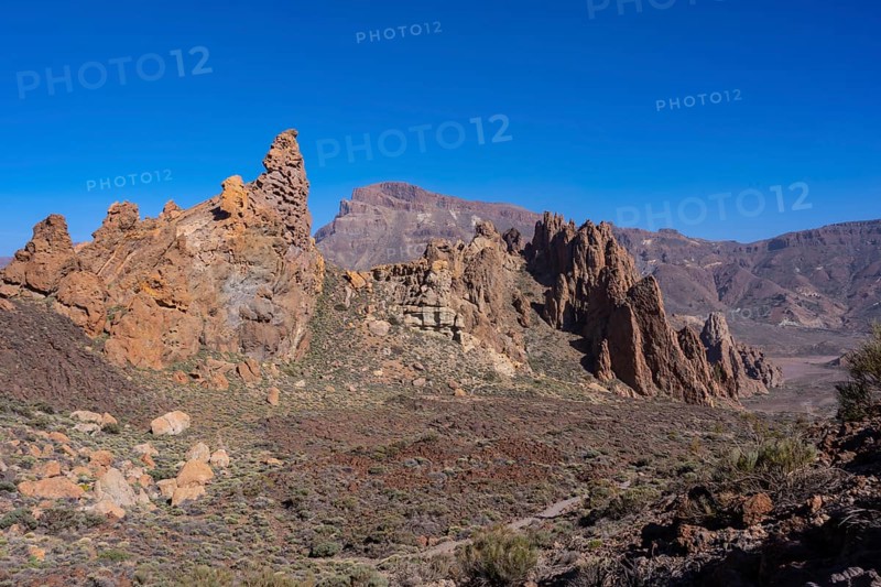 Downhill path in the Roques de Gracia and the Roque Cinchado in the natural area of Teide in Tenerife