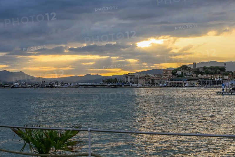 View from the Croisette in the evening on the old town and the Palais des Festivals