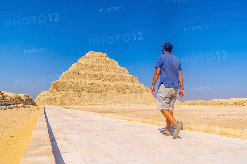 A young man walking in the Stepped Pyramid of Djoser