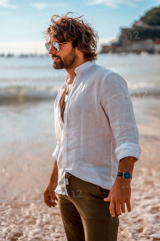 Summer lifestyle with a young dark-haired Caucasian man with long beard
