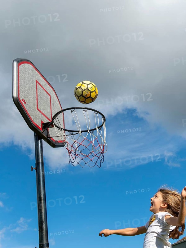 Basketball Jump with the ball to the basket and net