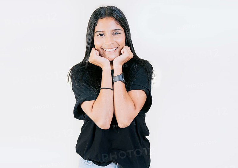 Portrait of friendly latin girl smiling isolated. Close up of Latin American girl face looking and smiling at the camera. Young Nicaraguan woman smiling at camera