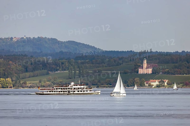 Excursion boat KARLSRUHE underway on Lake Constance against the backdrop of Birnau Monastery