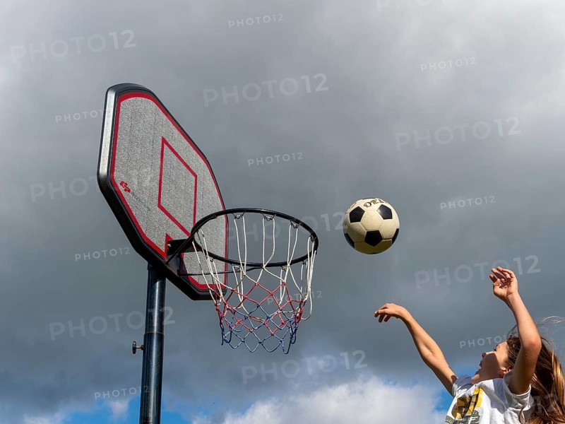 Basketball Jump with the ball to the basket and net