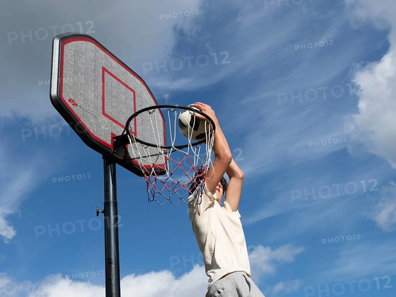 Basketball Jump with the ball to the basket and net