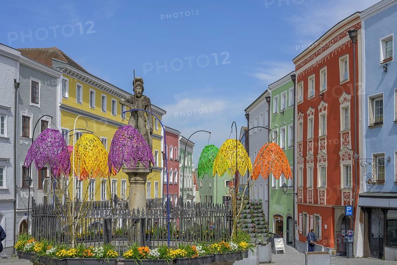 Fountain and old houses on the lower town square