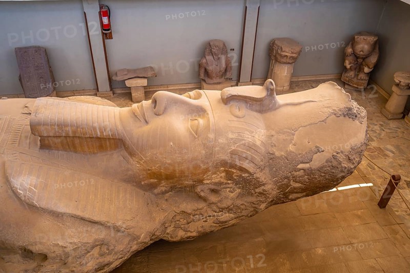 Detail from above of the sculpture of the Colossus of Ramses II in the Memphis museum in Cairo