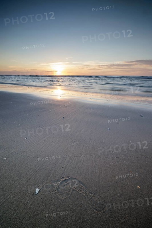 Sunset on the beach of De Panne