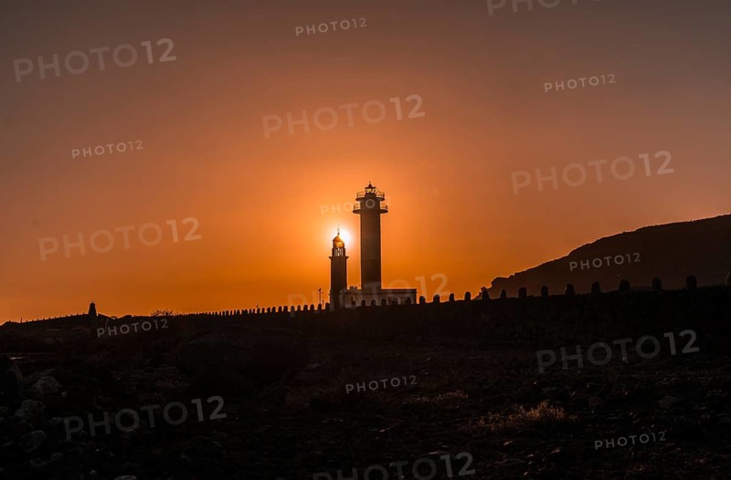Silhouette of the Fuencaliente Lighthouse at sunset