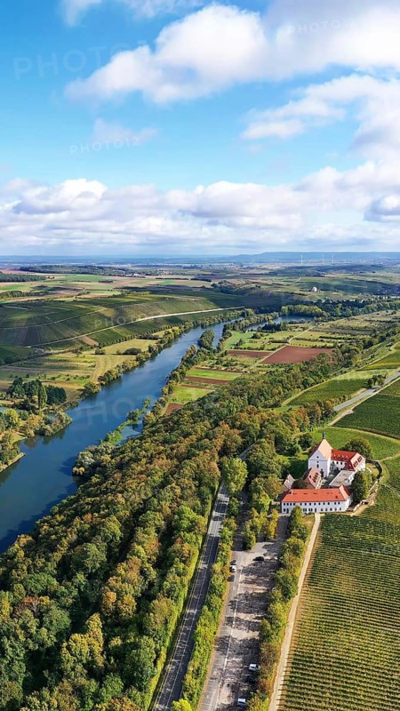 The Mainschleife near Volkach winds through the valley and is surrounded by fields and vineyards. Volkach