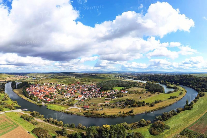 The Mainschleife near Volkach winds through the valley and is surrounded by fields and vineyards. Volkach