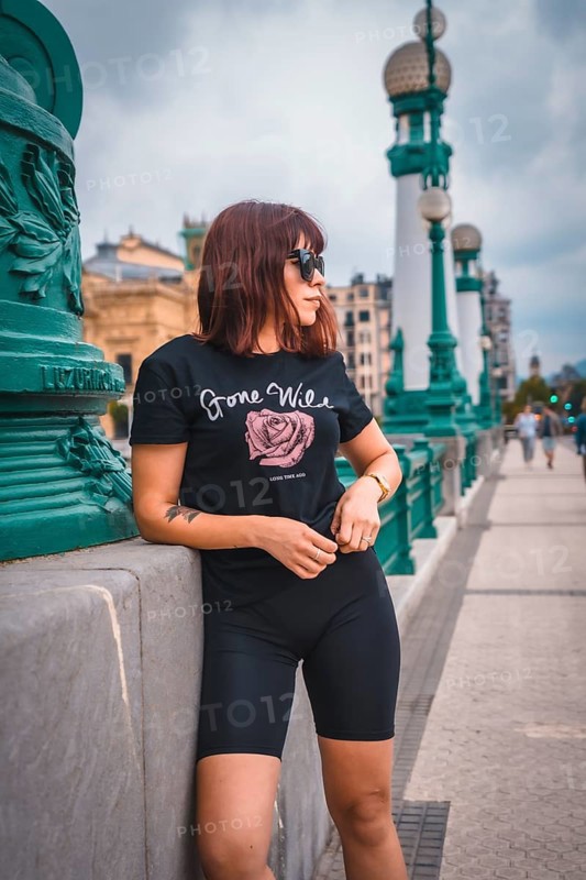 Lifestyle in the city. A young brunette with sunglasses