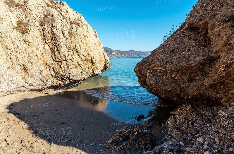 Small coves on Calahonda beach in the town of Nerja
