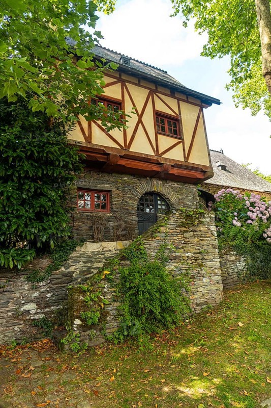 Old colored house in the medieval village of Rochefort-en-Terre