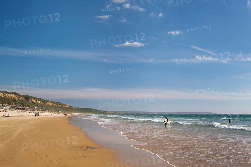 Sandy Atlantic ocean beach at Fonte da Telha beach