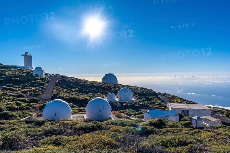 Observatories of the Roque de los Muchachos in the Caldera de Taburiente with a sea of nuts below one summer afternoon