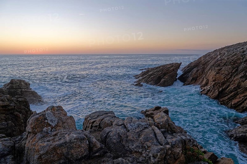 Evening atmosphere on the Cote Sauvage. The Wild Coast is a rocky coast in the west of the Quiberon peninsula in Brittany. Cores