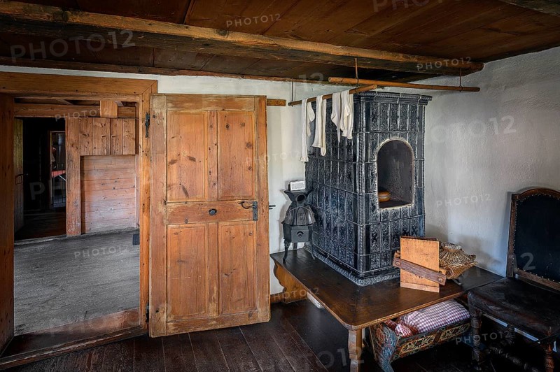 Parlour with tiled stove in the Swabian Open Air Museum