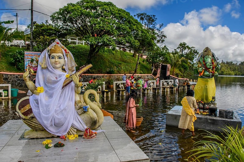 Left Goddess of Wisdom Sarasvati Saraswati Maa Wife Consort of Lord Brahma Right God Deity Statue in Elephant Shape Shape of Elephant Elephant God Ganesha at Religious Site Largest Hindu Sanctuary Sanctuary for Religion Hinduism outside India for devout Hindu Hindus