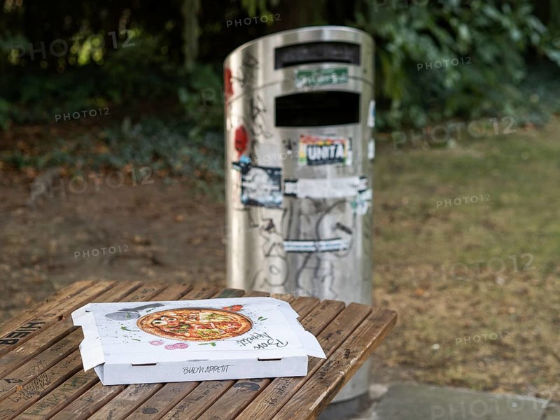 Pizza box on a parking table