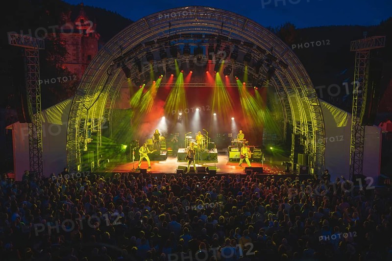 Cheering crowd at Live Klostersommer Festival in Historic Monastery