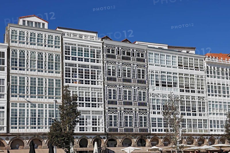 Decorative house facades on the harbour promenade in the historic city centre of La Coruna