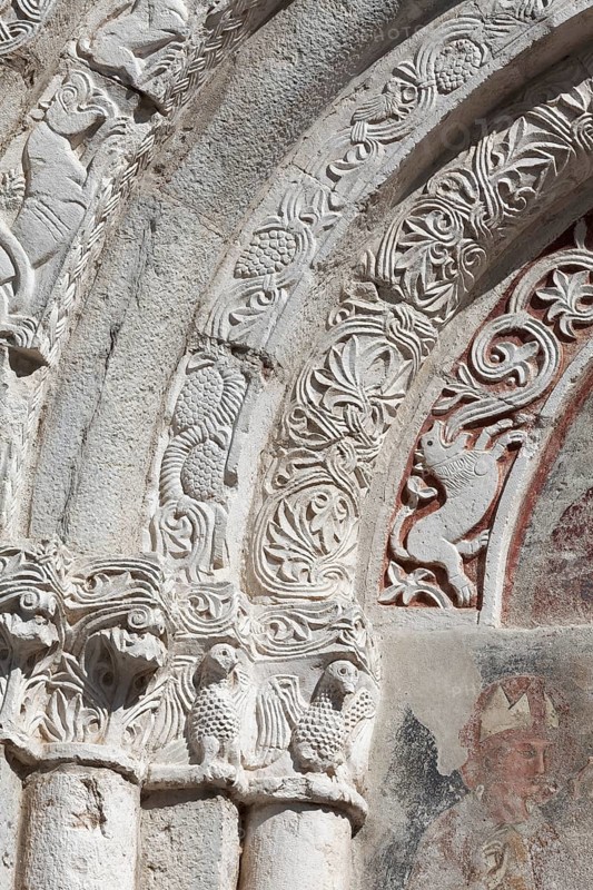 Columned porta with ornaments and figures