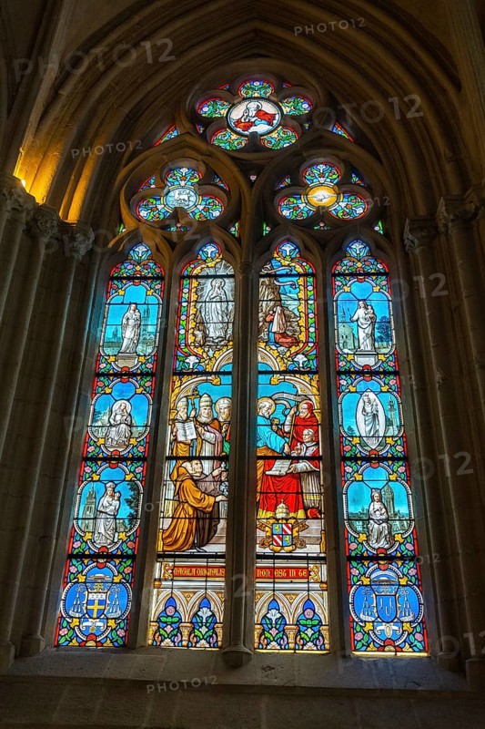 Stained glass inside the Saint Corentin cathedral in the medieval village of Quimper in the Finisterre department. French Brittany