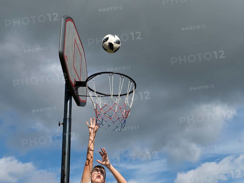 Basketball Jump with the ball to the basket and net