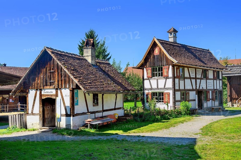Two half-timbered houses with brick chimneys in the Swabian Open Air Museum