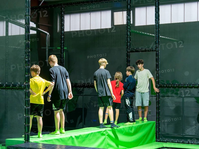 Children in trampoline arena