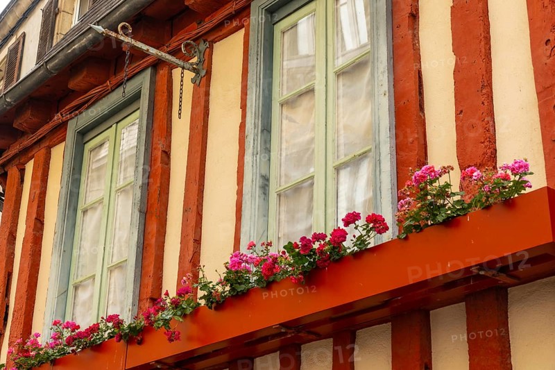 Old wooden colored houses in the medieval village of Quimper in the Finisterre department. French Brittany