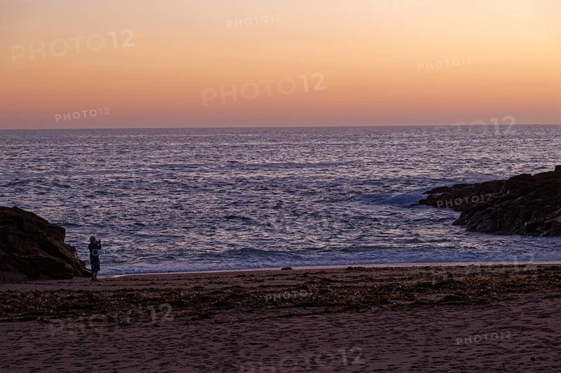 Evening atmosphere on the Cote Sauvage. The Wild Coast is a rocky coast in the west of the Quiberon peninsula in Brittany. Cores