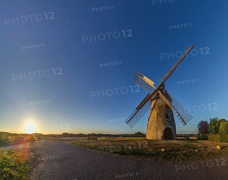 Windmill Auf der Hoechte at sunset is part of the Westphalian Mill Road and is located in Hille