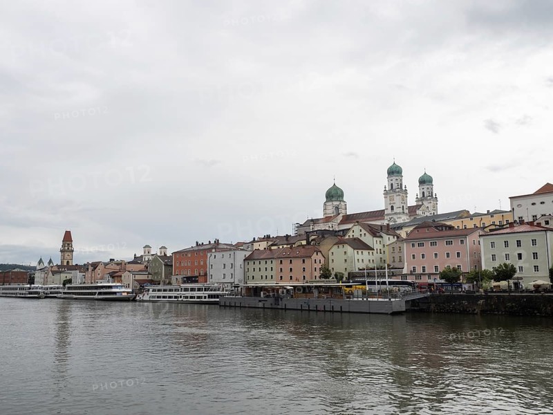 View over the Danube to the old town with the town hall and the cathedral