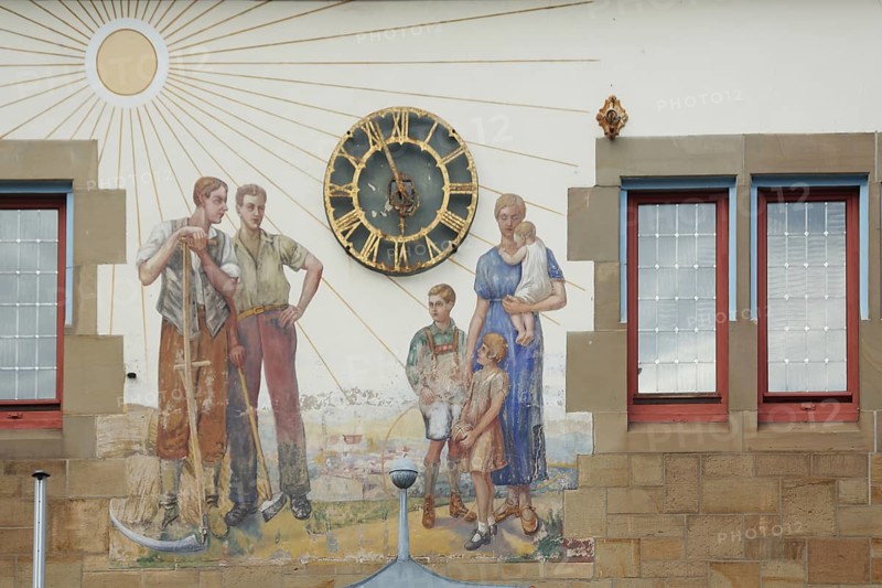 Sundial and mural at the town hall