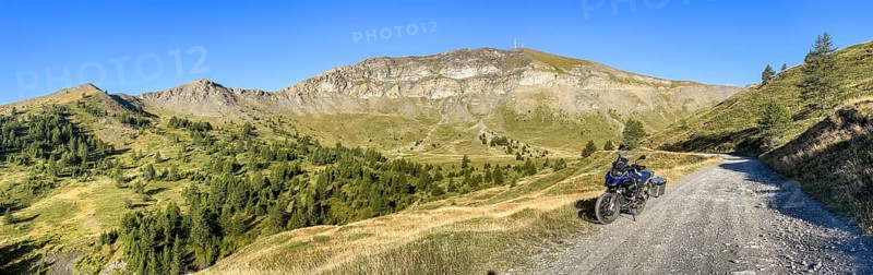 Motorbike BMW R1200 GS Adventure on Strada dell'Assietta military alpine road near Colle Basset