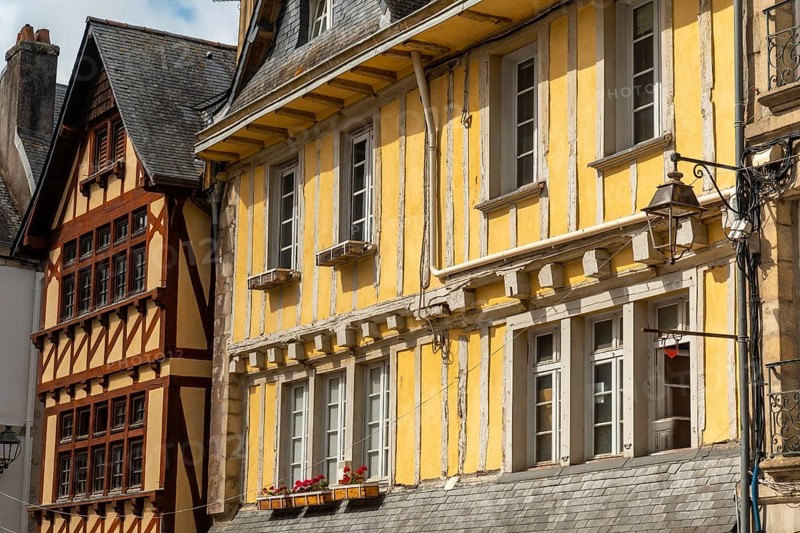 Old wooden colored houses in the medieval village of Quimper in the Finisterre department. French Brittany