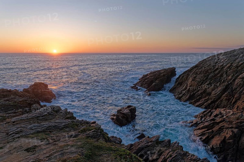 Sunset on the Cote Sauvage. The Wild Coast is a rocky coast to the west of the Quiberon peninsula in Brittany. Cores
