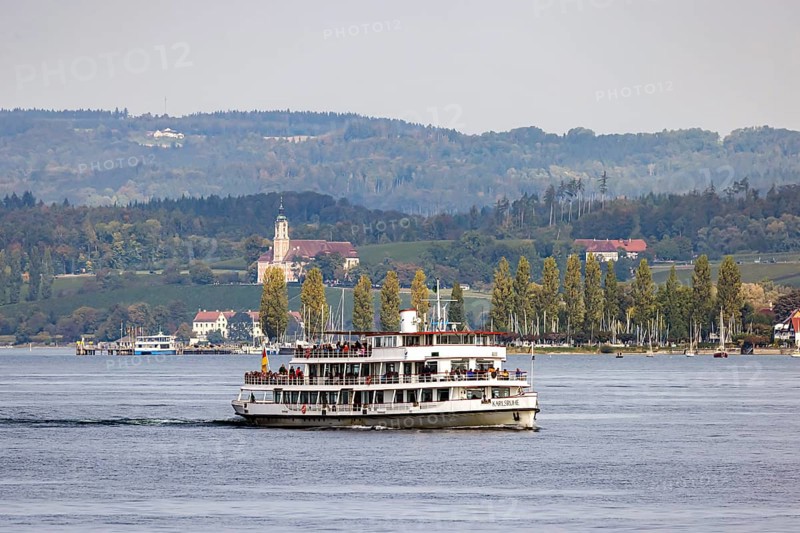 Excursion boat KARLSRUHE underway on Lake Constance against the backdrop of Birnau Monastery