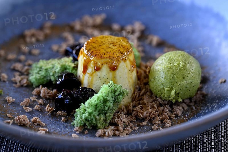 Lemon grass pannacotta with pistachio ice cream at a restaurant