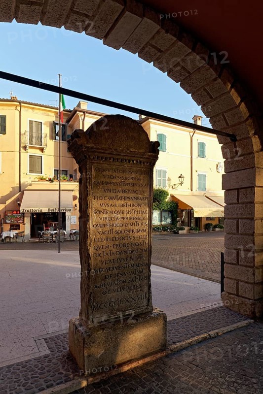 Memorial stone to the translator Domizio Calderini