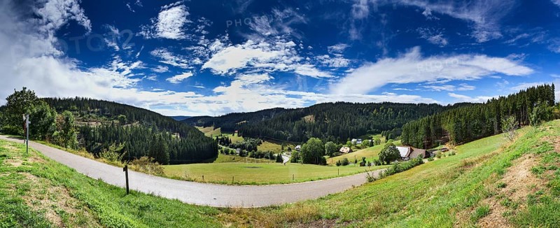 Landscape with blue and white sky near Furtwangen in the Black Forest