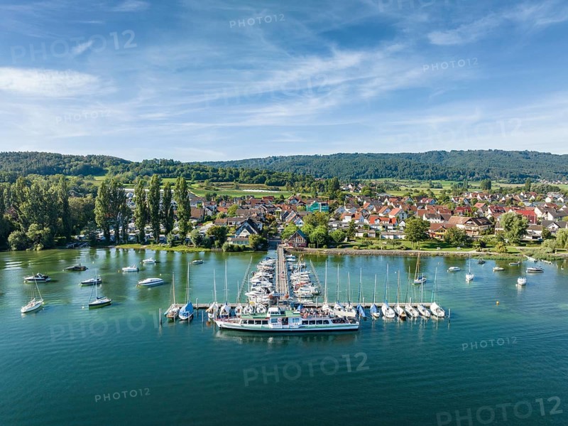 Aerial view of the jetty and marina of the Lake Constance municipality of Iznang on the Hoeri peninsula with the cruise ship MS Reichenau