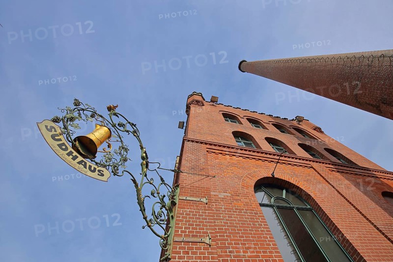 Red brewhouse with chimney and nose shield