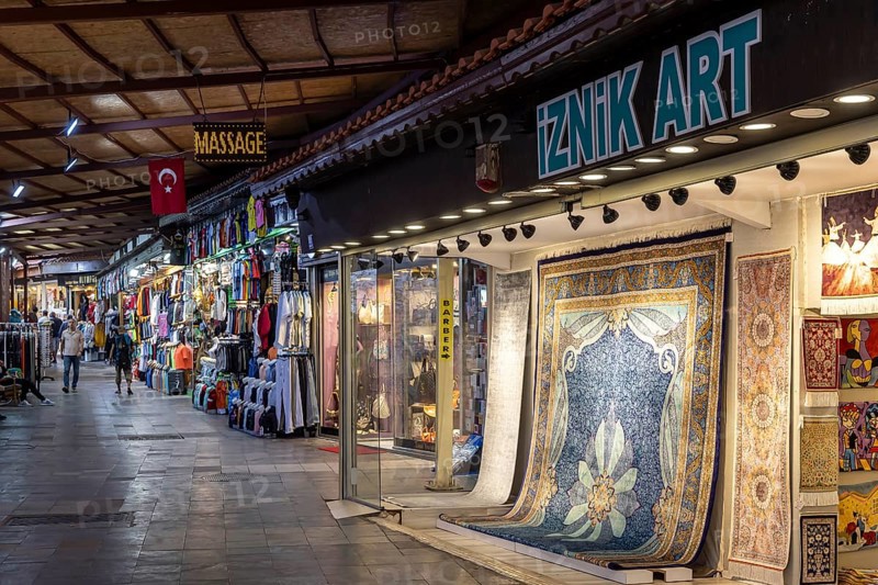 Bazaar in Kusadasi with clothes and carpets