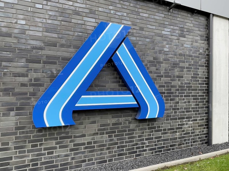 Perspective photo of logo A in blue without lettering on wall of supermarket of retail chain supermarket Aldi Nord