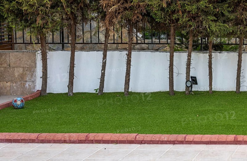 Garden in the Turkish town of Kusadasi with artificial grass