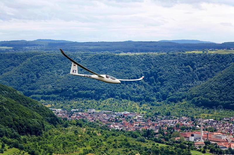 Glider flying over Unterlenningen in the Swabian Alb