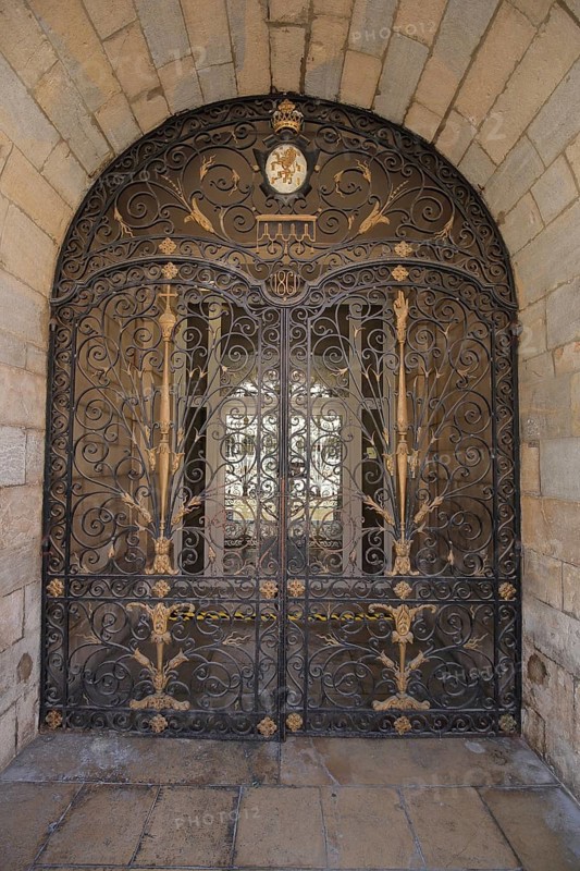 Metal gate with decorations from the Hotel de Ville